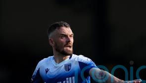 Gillingham return to winning ways as Scott Malone strike downs 10-man Sutton