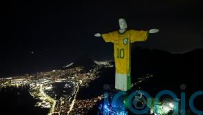 Christ the Redeemer statue illuminated with Brazil shirt as tribute to Pele
