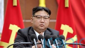 Kim Jong Un vows to launch more spy satellites and make more nuclear material