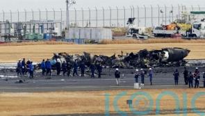 Japanese officials begin on-site inquiries after fatal crash at Tokyo airport