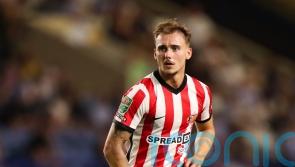 Woman allegedly raped by footballer went to his home for ‘cuddles and company’