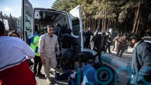 At least 95 killed in twin blasts at ceremony honouring Iranian general
