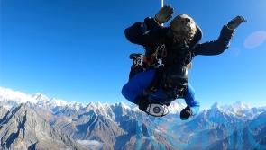 Former rugby player completes 24,000ft skydive clutching rugby ball