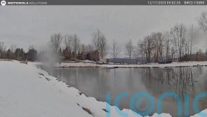 US state trooper plunges into icy pond to save eight-year-old girl