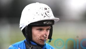 Sutton sits tight to steer Santos Blue to victory