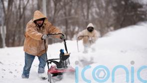 Dangerously cold weather in US closes schools and grounds flights