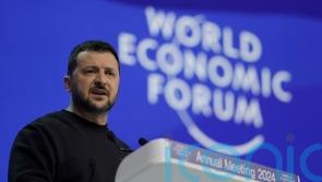 Zelensky lashes out at Putin and urges Davos forum’s support for Ukraine’s fight