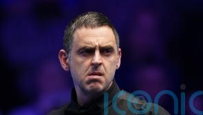 Ronnie O’Sullivan wins World Grand Prix opener as Ali Carter feud continues
