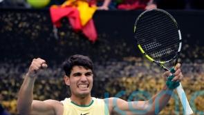 Carlos Alcaraz battles through on testing day for top names at Australian Open