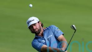 Cameron Young leads the way at Dubai Desert Classic as Rory McIlroy falls back