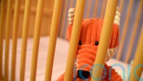 Safety warning over co-sleeping after 19 infant deaths last year