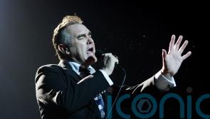 The Cure member sends support to Morrissey as he receives ‘medical supervision’