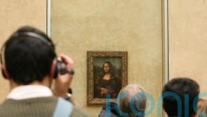Two people arrested after protesters throw soup at Mona Lisa