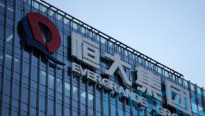 Court orders China Evergrande property developer to liquidate