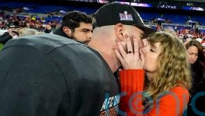 Are you ready for it? Taylor Swift kisses Travis Kelce as he heads to Super Bowl