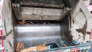 Woman throwing out rubbish survives being compacted in bin lorry