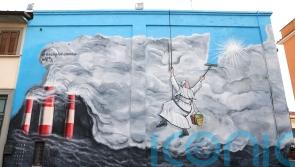 Super Pope street artist gets new stamp of Vatican approval
