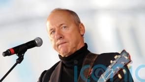 Dire Straits star Knopfler unites world guitar heroes for charity record