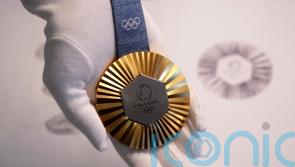 Medals for Paris 2024 Olympics embedded with pieces of Eiffel Tower