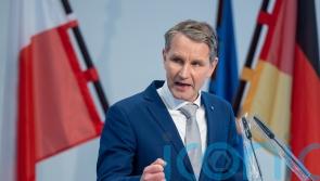 German far-right politician to go on trial for alleged use of a Nazi slogan