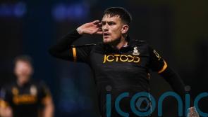 Wrexham suffer third straight league loss as Andy Cook snatches win for Bradford
