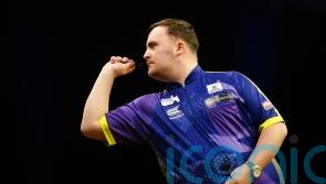 Luke Littler hits nine-dart finish on the way to landing his first ranking title