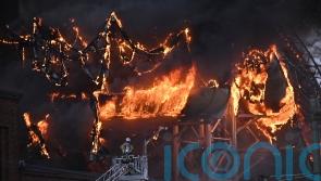 One person missing as firefighters battle Sweden water park blaze for second day