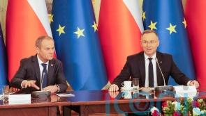 Poland’s prime minister says authorities used spyware under previous government