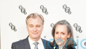Christopher Nolan honoured with BFI Fellowship in front of Oppenheimer stars