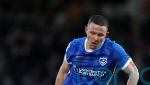 Portsmouth hammer Reading to strengthen hold on top spot