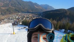 Teenager who broke back in sledging accident returns to the slopes