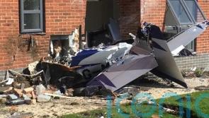 Pilot bailed out moments before plane crashed into flats