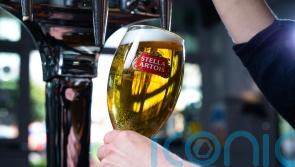 Budweiser and Stella Artois brewer says sales growth driven by higher prices