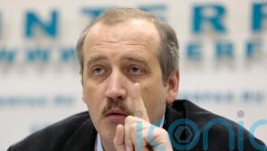 Editor of top independent Russian newspaper detained for ‘discrediting military’