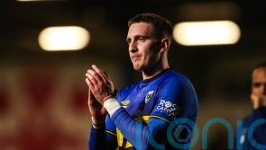 Ronan Curtis snatches last-gasp victory for AFC Wimbledon against MK Dons