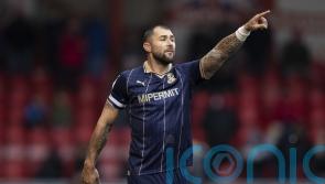 Charlie Austin salvages point for Swindon against Harrogate