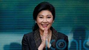 Thai court acquits former PM over mishandling of government funds