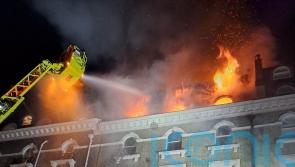 Dramatic footage of flats fire rescue released by police as suspect arrested