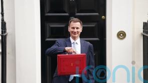 Hunt promises to cut taxes and boost growth in pre-election Budget
