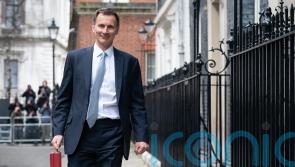 Hunt cuts national insurance in pre-election Budget giveaway