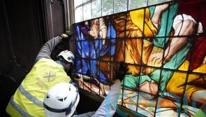 Protective glazing added to protect 18th century stained glass in Gothic tomb