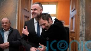 Greek novelist and lawyer are first same-sex couple to wed at Athens city hall