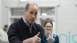 William expresses concern at mobile phone use as he visits youth club