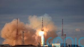 Russian Soyuz spacecraft docks at International Space Station