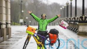 Timmy Mallett visits Stormont during Northern Ireland cycle trip