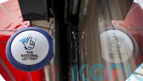 National Lottery firm sees UK sales and earnings slip