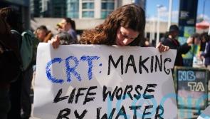 Boaters criticise licence price rises with banners at London protest