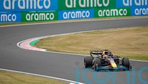 Max Verstappen sets the pace in Japan as Logan Sargeant crashes out