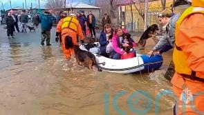 Russia declares emergency in flood-hit region as evacuation efforts continue