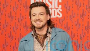 Country star Morgan Wallen arrested ‘after throwing chair off roof of bar’